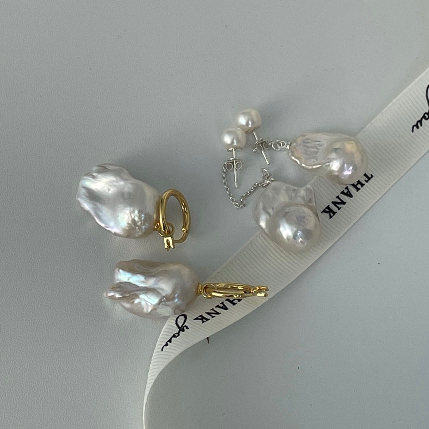Fishtail baroque pearl earrings