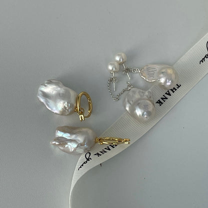 Fishtail baroque pearl earrings
