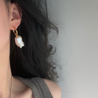 Fishtail baroque pearl earrings